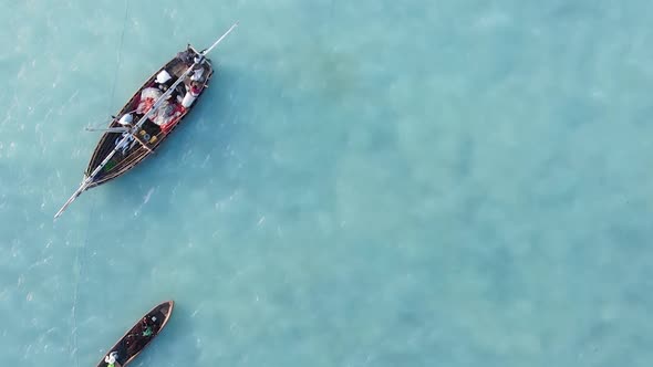 Tanzania Vertical Video  Boat Boats in the Ocean Near the Coast of Zanzibar Aerial View