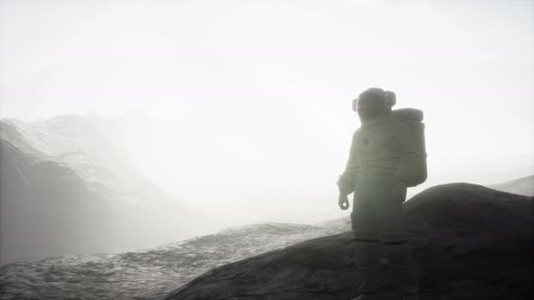 Astronaut on Another Planet with Dust and Fog