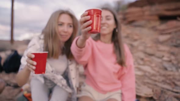 Two Female Friends Talking and Laughing