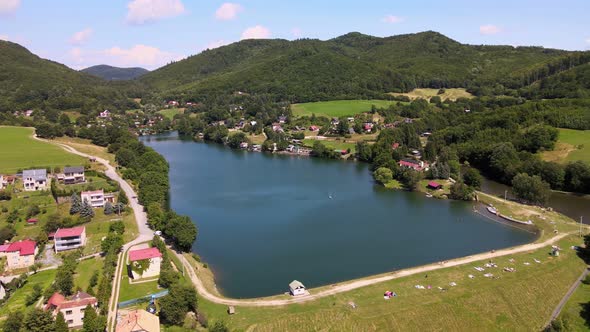 Aerial view of a lake in the village of Bansky Studenec in Slovakia