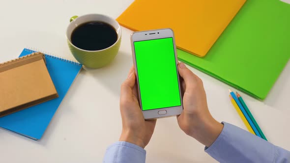 Student Holding Smartphone With Green Screen, Online Education App, Lessons