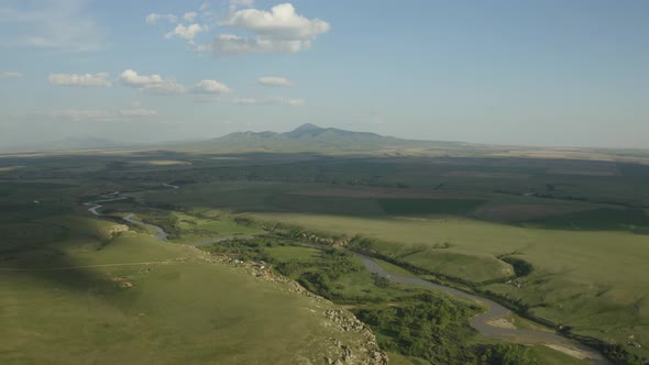 aerial of beautiful Alberta countryside in Canada featuring a winding river