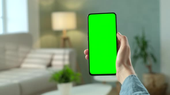 POV View of Woman at Phone with Green Screen for Copy Space. Chromakey Mock Up Without Tracking