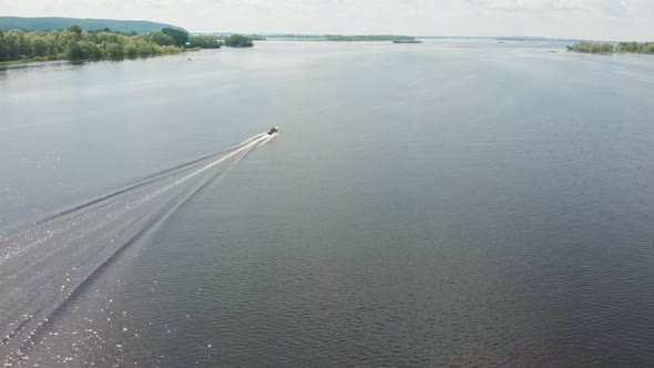 Motor Boat Floating on River - Green Nature