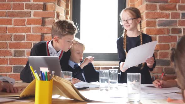 Young Business People Discussing Problems of Company