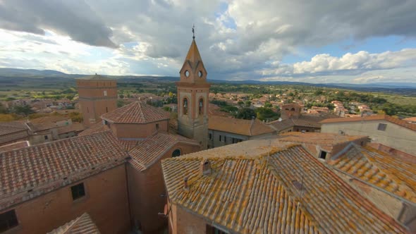 Rooftop View Of Old Structures In Comune Sinalunga Italy - aerial shot