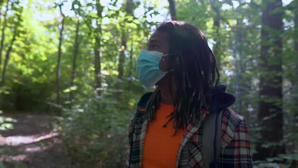 African American Man Wearing COVID19 Mask Scenic Nature Setting