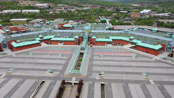 Aerial footage of a large shopping centre known as Meadowhall in the UK