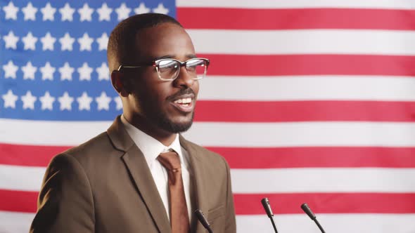 Afro-American Male Politician Giving Public Announcement