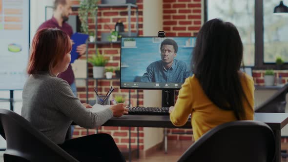 Asian Women Meeting with Man on Online Video Call for Job Interview