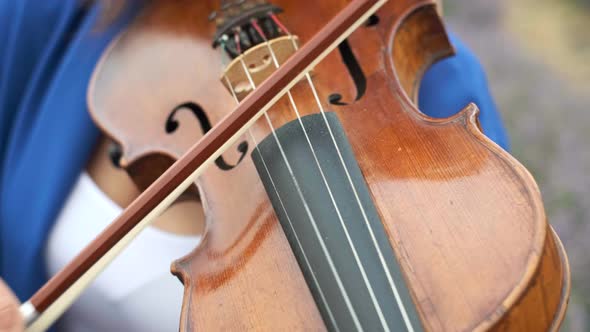 Unrecognizable Woman Musician Playing Performing Violin Outdoors Closeup