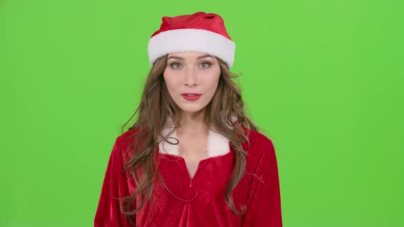 Snow Maiden Points Her Finger a Little More Quietly. Green Screen. Close Up. Slow Motion