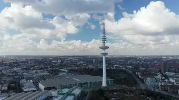 Close Up Aerial Dolly View of Heinrich Hertz TV Tower Above Hamburg Urban City Center