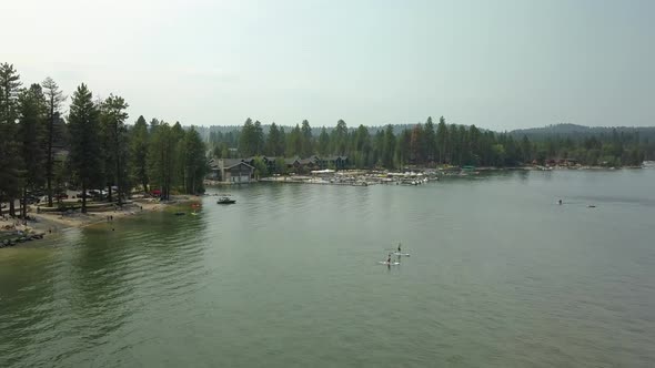 Lakeside Boaters And Paddleboarders