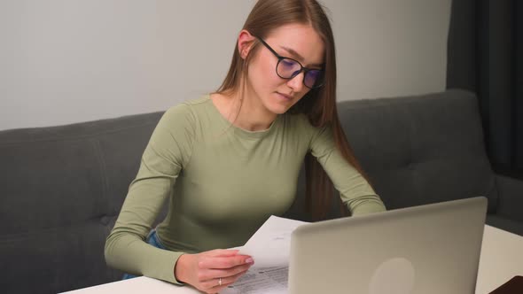 Woman in Glasses Working with Laptop Online Distance Education Video Call Conference