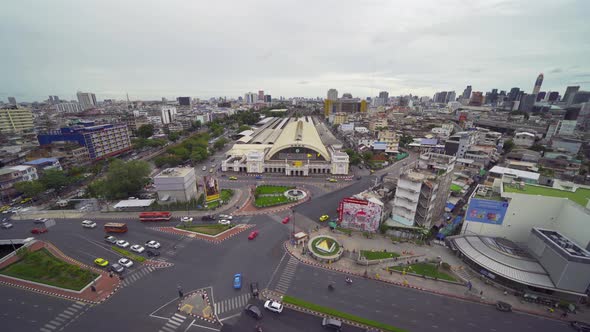 Aerial view of Hua Lamphong or Bangkok Railway Terminal Station with skyscraper buildings