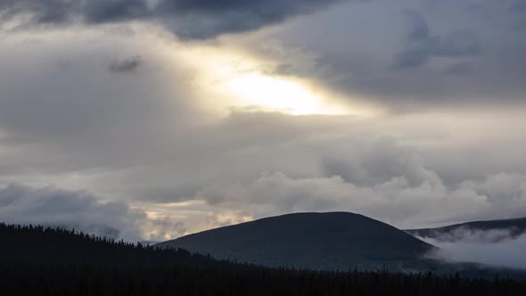 Time Lapse of Beautful Sunset with Clouds and Mountains