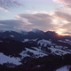 Aerial View Sunset Over Winter Mountain Trees Landscape Colored Clouds at Dusk - VideoHive Item for Sale