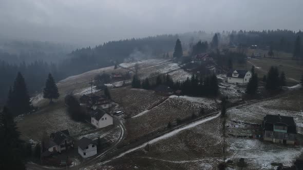 Winter Landscape Of The Carpathian Mountains In The Fog From A Bird's Eye View