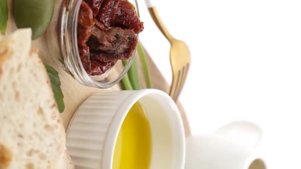 Vertical video: Olive oil with ingredients