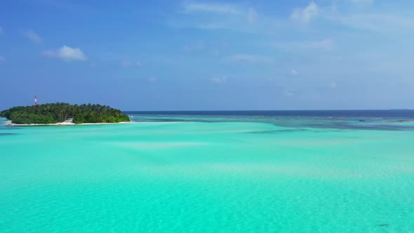 Aerial top down scenery of exotic coast beach break by clear lagoon and white sandy background of a 