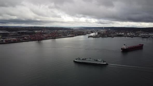 Aerial Chase of a Washington State Ferry Arriving in Seattle with the Port in the Background