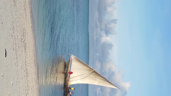 Tanzania Vertical Video  Boat Boats in the Ocean Near the Coast of Zanzibar Aerial View