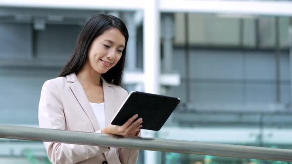 Business woman working on tablet computer 