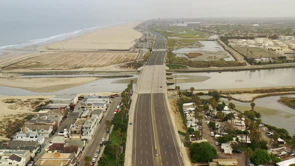 4k aerial view of the coastline with space traffic during the summer months due to the covid 19 coro