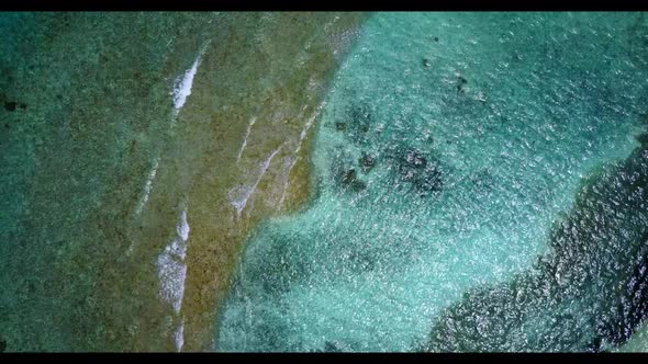 Aerial drone view abstract of exotic island beach holiday by transparent lagoon and white sandy back