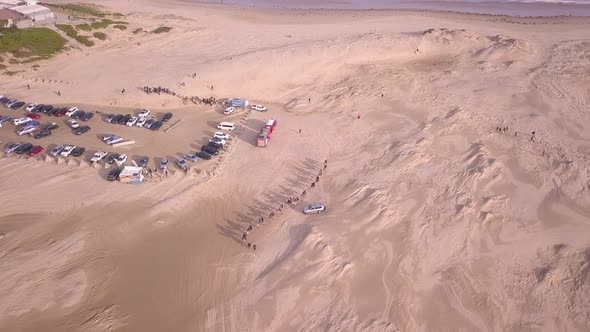 Aerial top down of Desert Camel Rides attraction and sand dunes at Anna Bay. New South Wales, Austra