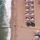 Flight Over the Beach with Umbrellas Towards the Pool in a Luxury Hotel - VideoHive Item for Sale
