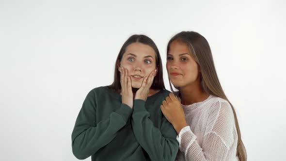 Female Friends Looking Away, Laughing Looking Surprised