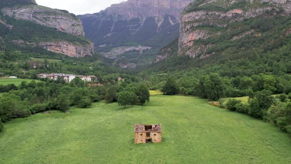 Old house in mountainous valley