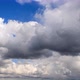 Large, dark cumulus clouds move across the sky - VideoHive Item for Sale