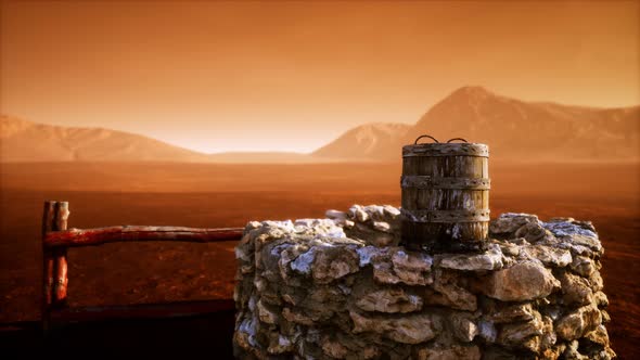 Old Stone Water Well in the Desert alt