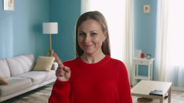 Young Woman Portrait Showing Never Do This Gesture