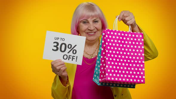 Elderly Granny Woman Showing Shopping Bags and Up To 30 Percent Off Inscriptions Text Black Friday