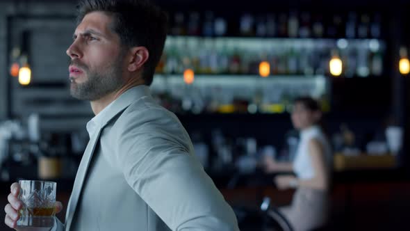 Serious Boss Holding Whiskey Glass Portrait