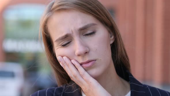 Woman Reacting to Toothache, Tooth Infection