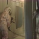 Worker in Protective Suit Sprays Powder Paint From Gun on Metal Products - VideoHive Item for Sale
