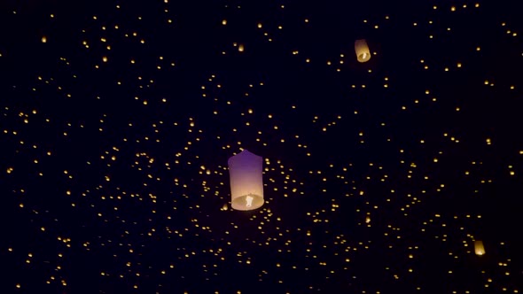 Sky Lanterns Fly Into The Night Sky