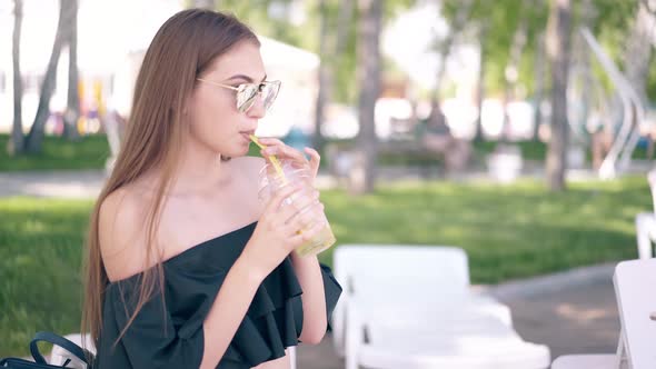 Portrait of Hot Attractive Girl Wearing Sunglasses on Beach