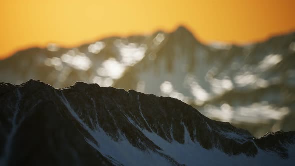 Winter Landscape in Mountains at Sunset