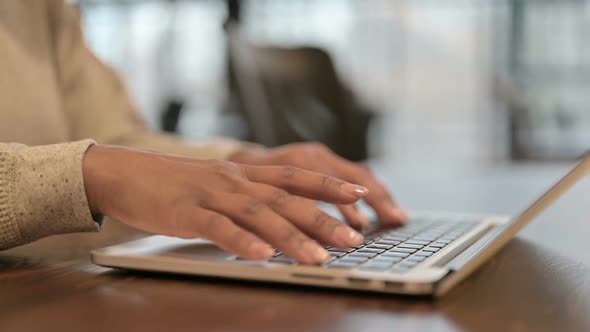 Close Up of Female Hands Typing on Laptop