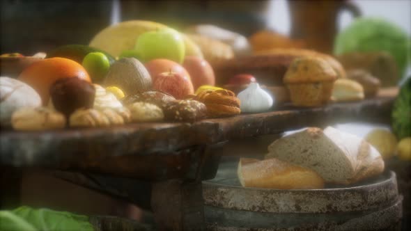 Food Table with Wine Barrels and Some Fruits Vegetables and Bread