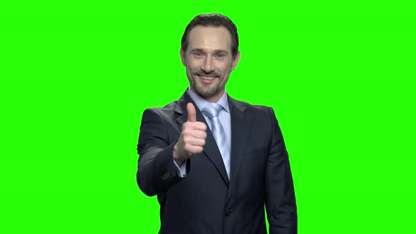 Happy Caucasian Businessman Showing Thumbs Up