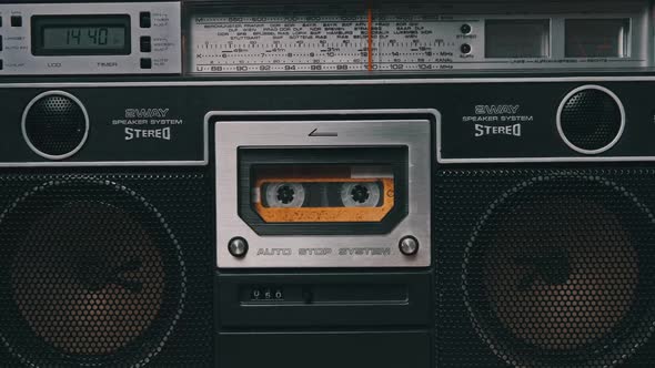 Vintage Audio Cassette Rotates in Old Tape Recorder