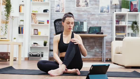 Young Caucasian Woman in Sportswear Practicing Yoga