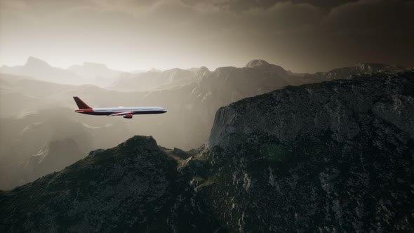 Passenger Aircraft Over Mountain Landscape